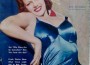 Rita Hayworth wearing a blue swimsuit on cover of 1940 Screen Guide - Swimsuit issue.